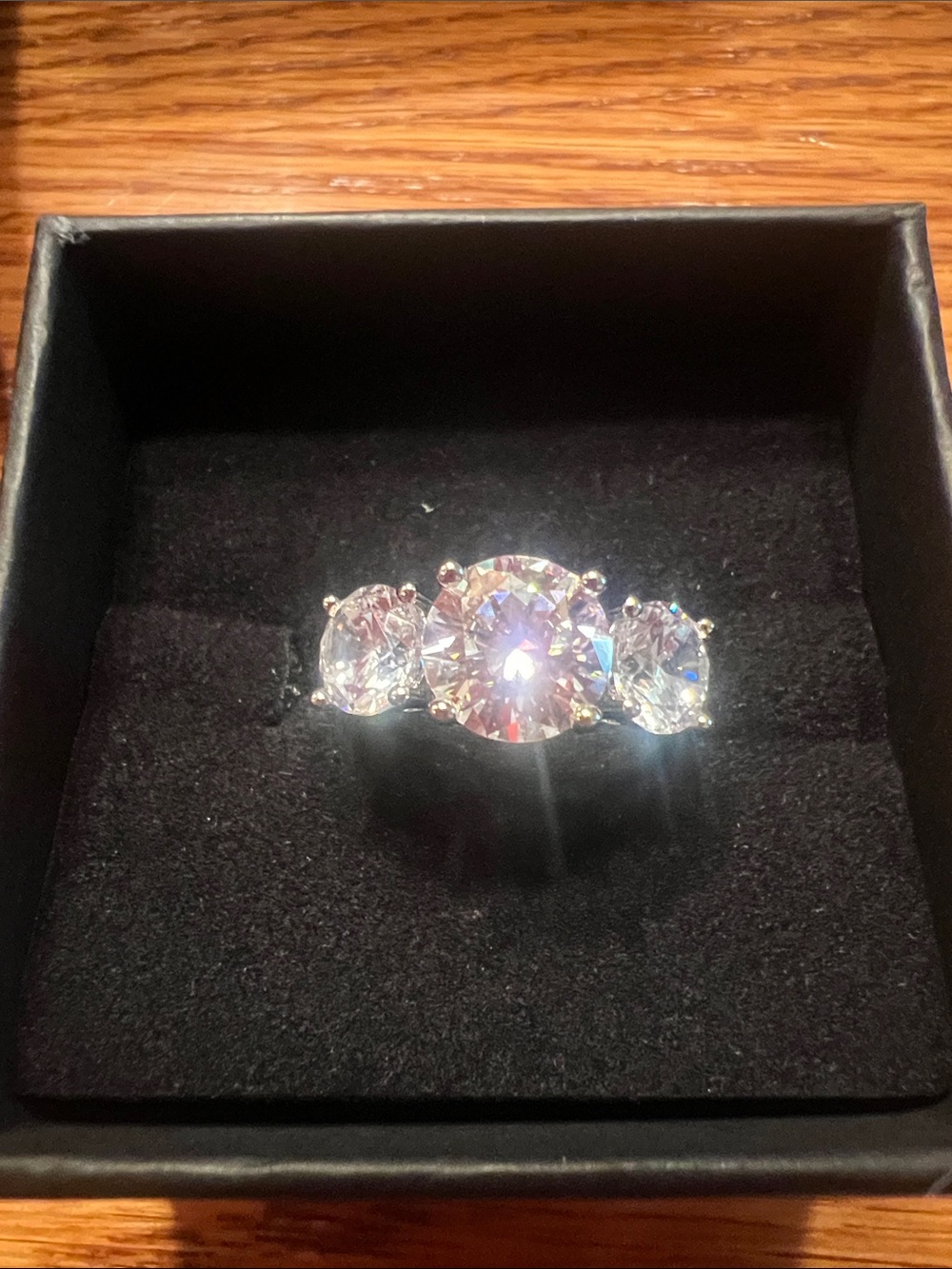 New 3 stone Moissanite and silver plated. Size 5 ring